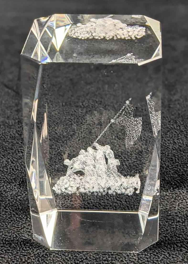 3D Laser Crystal Paperweight Raising The Flag On Iwo: Laser Crystal Paperweight/ Laser Etched 3D Image. Encased In A Solid Glass Cube. Shows the famous 'Raising The Flag On Iwo Jima' inside. Is approx 2" x 2" x 3" and is in a good, used condition with no