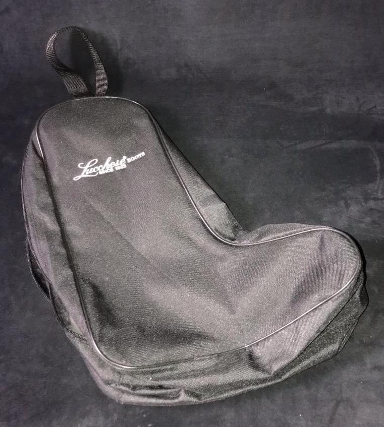 Lucchese Travel Storage Black BootBag: Black Lucchese Travel Storage Boot Bag With Individual Zippered Compartments.Bag is approx 13" x 16". Bag is in good. used condition with no known damage.
