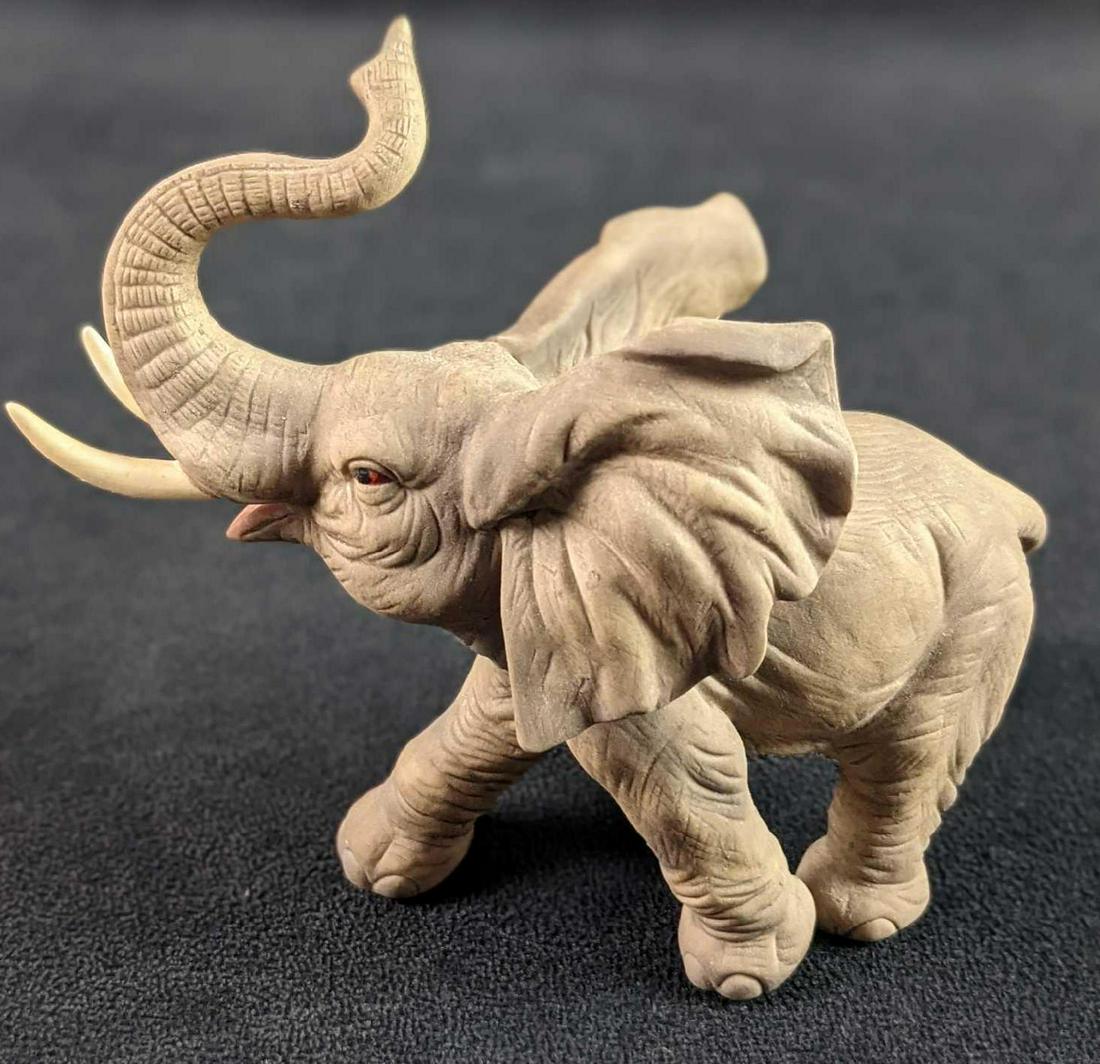 Elephant Hand Painted Porcelain Figurine By Andrea By: Elephant Hand Painted Porcelain Elephant Figurine By Andrea By Sadek. Is approx 7" x 3" x 5 1/2" and is in a good, vintage condition with no known damage.