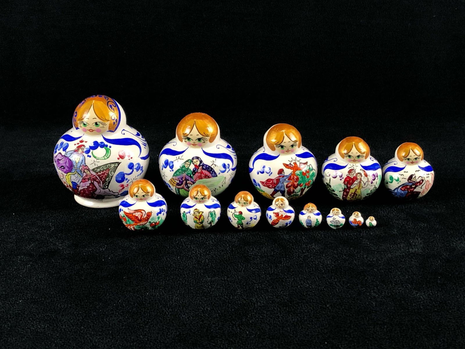 Hand Painted Wood Russian 13pc Matryoshka Nesting Dolls: This very detailed set of 3" 13pc nesting dolls are in Mint condition with no issues or missing pieces. Signed by the artist underneath. Please see all our pictures they are part of our description