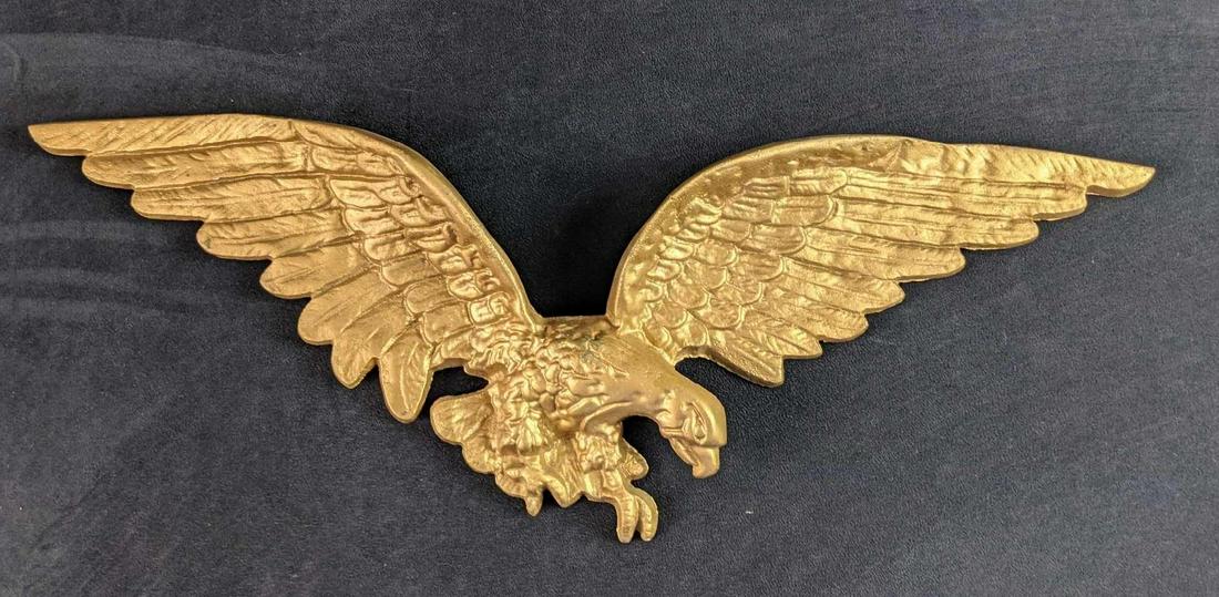 Metal Bronze Colored Wall Eagle: Enhance a gable, fireplace, or the exterior of your home with a bronze-colored metal eagle. This is approx 25" x 10" x 2". This appears to be made by Montague Metal Products. Is it a good, used condit