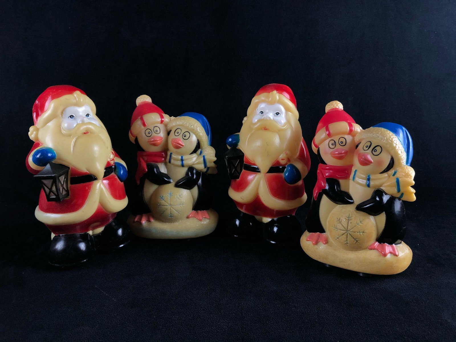 Vintage 1980's Santa's & Penguin's Blow Mold's 7": Vintage 1980's Santa's & Penguin's Blow Mold's 7" Figures Lot Of 4 .These fun festive classic blow molds are in very good condition with very little fading no cracks or dents.