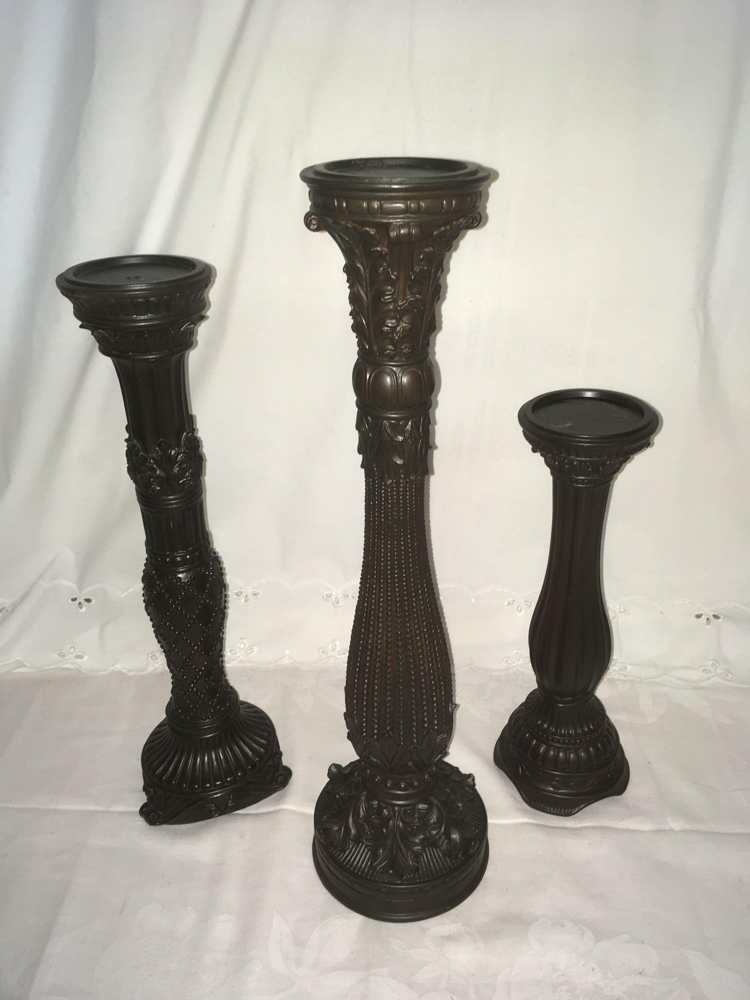Fitz and Floyd Neoclassical Pillar Candlesticks Lot: Vintage 1980's Neoclassical candlesticks. These 3 black and dark brown pillar candlesticks each have a different "carved" ornate design. Original Fitz and Floyd labels on the bottom of each. Appears t