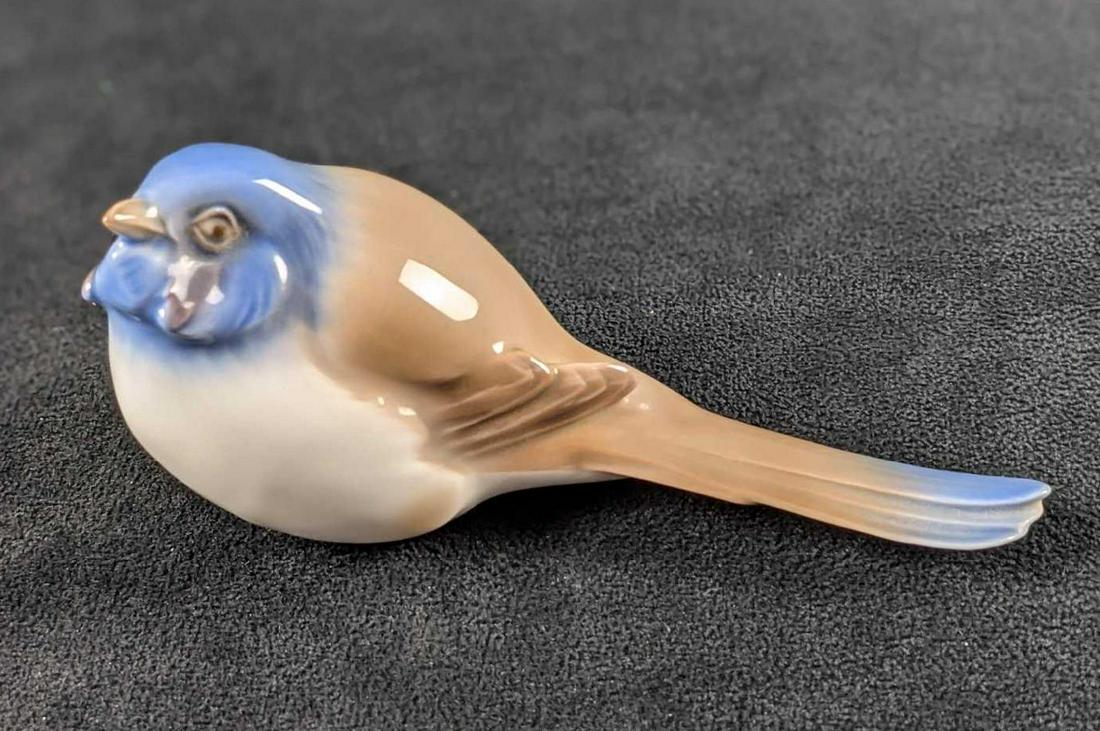 Bing & Grondahl Porcelain Optimist Titmouse Figurine: The Bing & Grondahl Company was established in 1853 by Grondahl, who was a figurine maker for the Royal Danish Porcelain Factory, and the Bing brothers, who were art and book dealers. In 1987 the comp