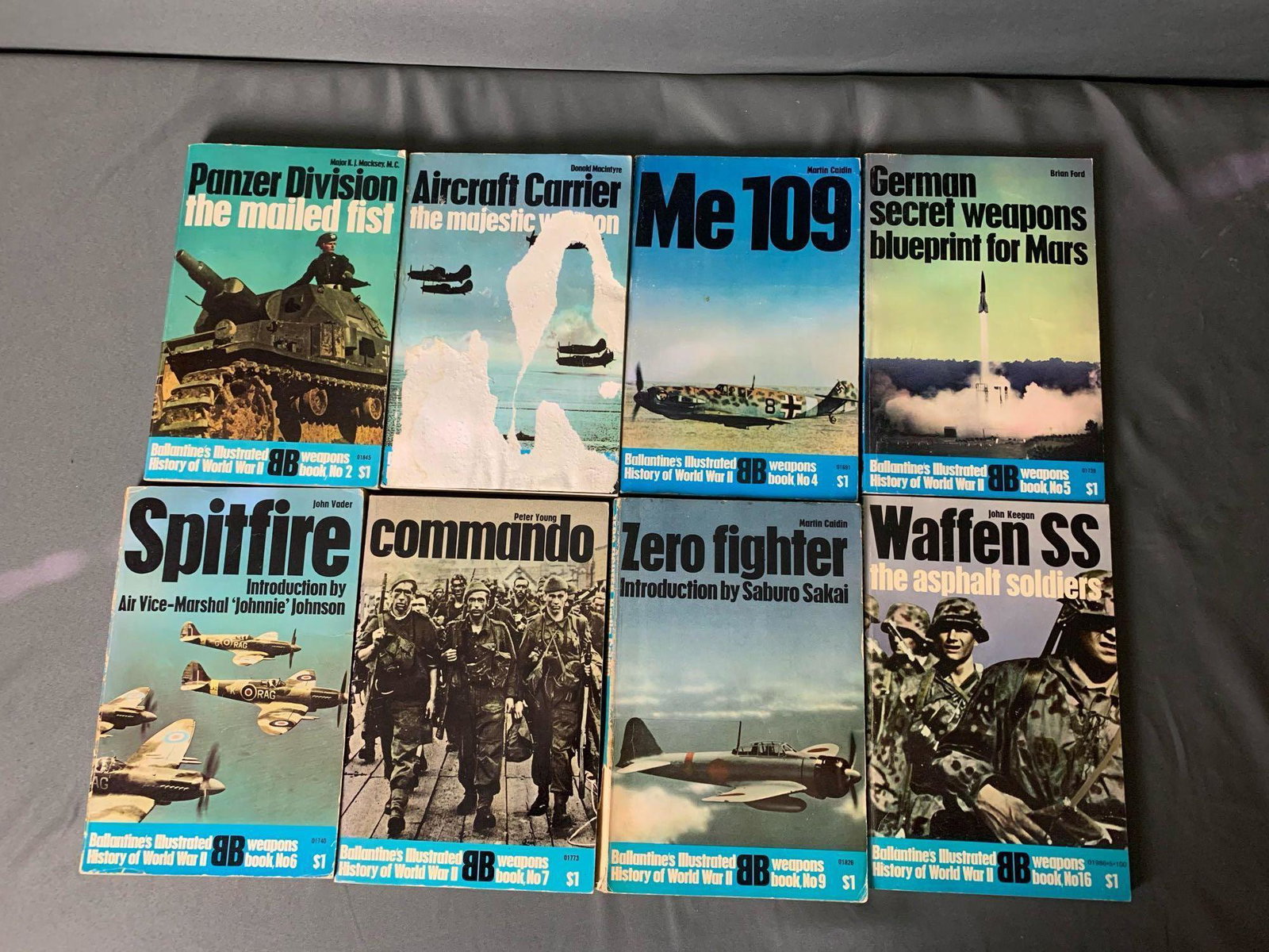 Lot 12 Paperback War Books: Ballentines Illustrated: Ballantine's Illustrated History of World War 2 Weapons Series Book #2 - Panzer Division the Mailed Fist by Major K.J Macksey, M.C.copyright 1968 Book #3 - Aircraft Carrier the Majestic Weapon by Dona