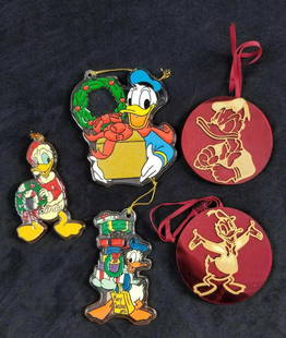 Vintage DIsney Acrylic Donald Duck Ornaments Lot Of: This lot includes: One Clear acrylic flat Donald Duck with Christmas reef. "Linda" has been inscribed on this ornament. Ornament is approx 2" x 3". One Clear acrylic flat Donald Duck with gift. Colors