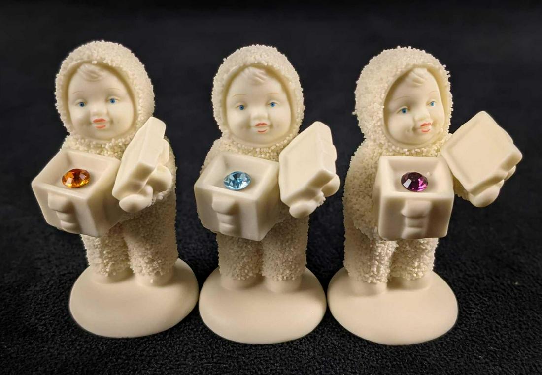 3 Snowbabies A Gift For You Birthstone Figurines: This lot includes: (1) February = Amethyst Swarovski Crystal Birthstone. (1) March = Aquamarine Swarovski Crystal Birthstone. (1) November = Topaz Swarovski Crystal Birthstone. All come in their origi