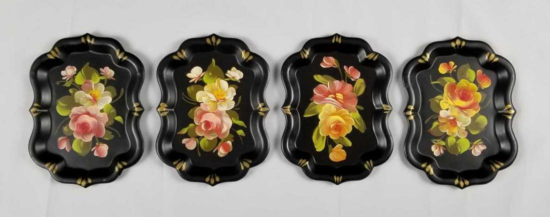 Toleware Floral Scalloped Metal Plates B: Toleware Floral Scalloped Metal Plates B lot of 4 is a beautiful set. They hand painted flowers on a matte black and have a gold accent on the scalloped edges. They are in good vintage condition with