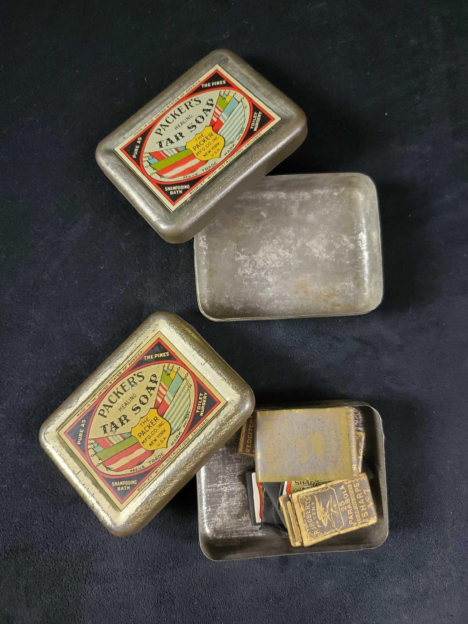 Packers Tar Soap Tins And Needles: Packers tar soap tins and needles are a neat find. Found within the tin were 4 wrapped R.J. Roberts Parabola gold burnished pack of needles. 1 of the packs of needles was missing the wrapper. There we