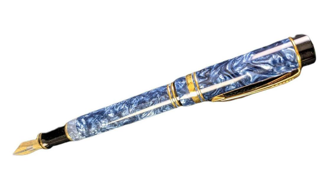 Parker Fountain Pen Duofold Centennial Marble Blue Nib: A symbol of excellence since 1921, Duofold remains the most distinguished pen in Parkerâ€™s discerning lineage. Driven by a commitment to superior craftsmanship, every detail of the Parker Duofol
