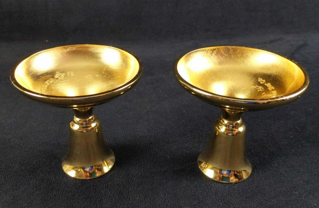 Two Vintage Electroplated Gold Candlestick Holders: International Silver Company Electroplated Console Candlestick Holders. Candles are approx 4" x 4" x 3 1/2". Both come in their original box which is approx 7" x 4" x 4 1/4". Candles are in good, vint