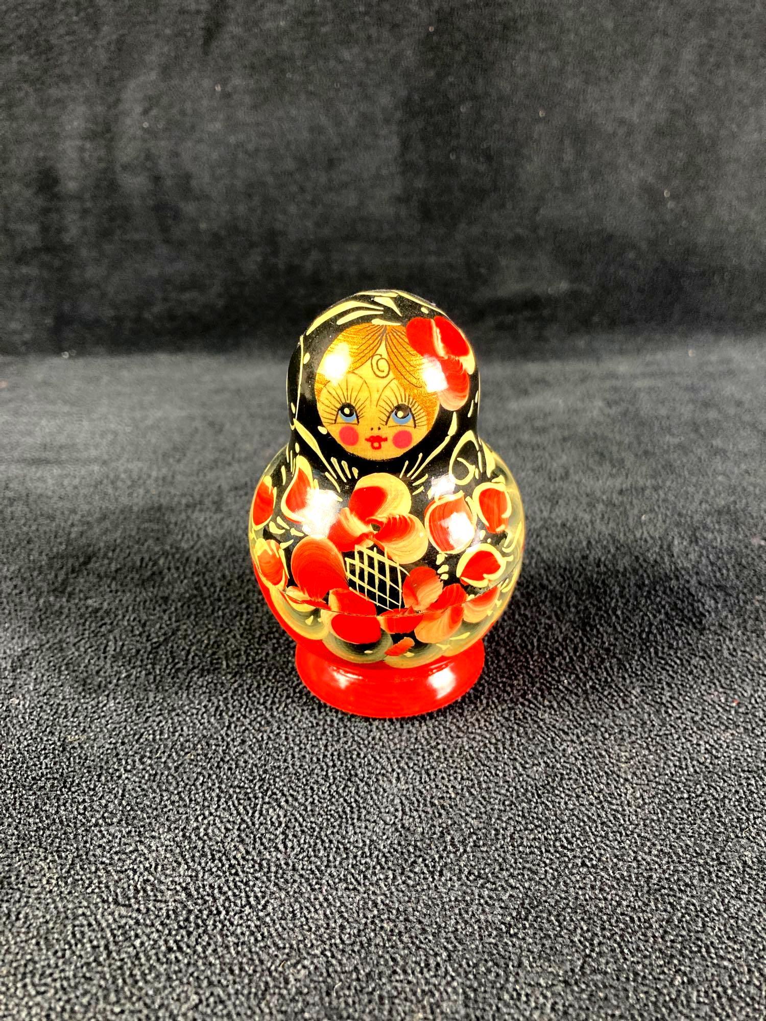Russian Nesting Doll: Up for auction is one Russian nesting doll fresh from a recent estate. Has all the dolls inside and are decorated in the likeness of a person. This auction includes: (1) Russian Nesting Doll Condition