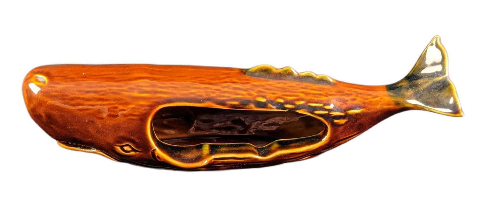 Unique Ceramic Japanese Whale Ashtray: Unique Ceramic Japanese Whale Ashtray. Hand-painted ceramic made in Japan. Ashtray is approx 12" x 4" x 4" and weighs under one pound at 0.94lb. Ashtray is in a good, vintage condition with some crazi