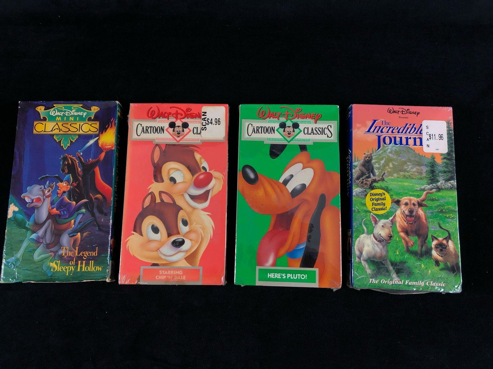 Vintage Lot Of 4 Walt Disney Productions VHS Color: Vintage Lot Of 4 Walt Disney Productions VHS Color Movies Sealed .This lot contains the following full length films : Chip & Dale Vol 9 Sealed Pluto Vol 5 Sealed The Incredible Journey Sealed The lege