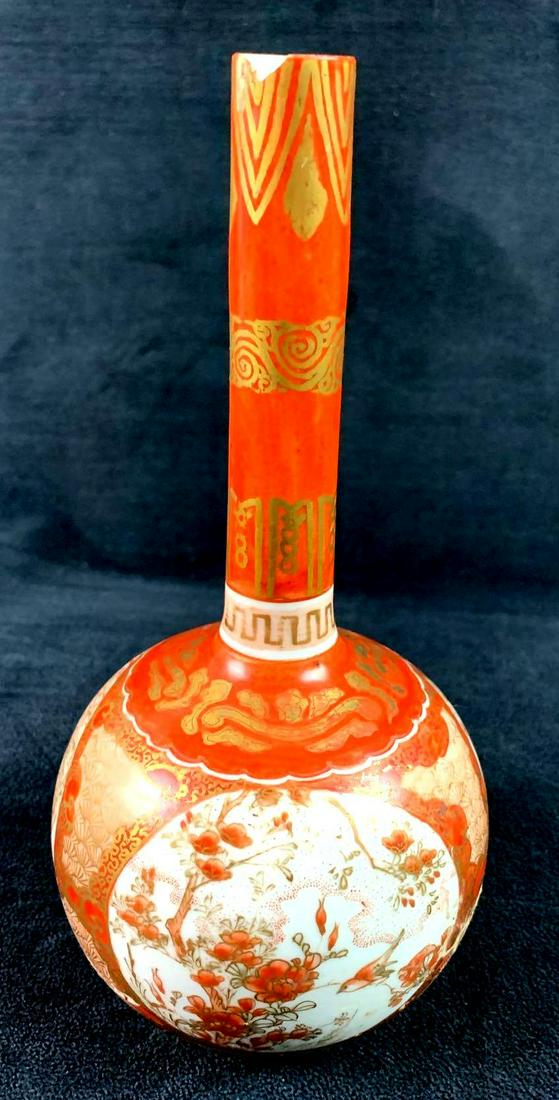 Vintage Japanese Long Neck Kutani Bottle: Vintage Japanese Long Neck Kutani Bottle Lovely vintage Japanese Bottle. Writing on bottom of bottle unknown translation. Please see photos. Condition: Good. There is a crack at top neck of the bottle
