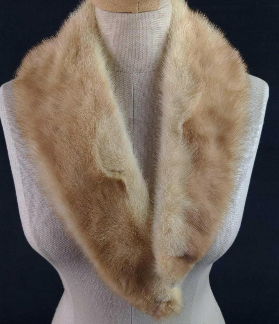 Mink Stole Scarf Wrap Y4: Mink Stole/scarf/wrap. The maker and date of creation are unknown. Is approx 26" x 5" and is in a good, used condition with a small rip on the back on the center.