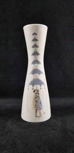 Vintage Rosenthal German Vase Lovers In the Rain: Rosenthal Germany Vase "Lovers in the Rain" artist Raymond Peynet, 1950's. The vase depicts lovers under an umbrella with birds singing in the rain. Makers mark on the bottom. The vase is in good cond