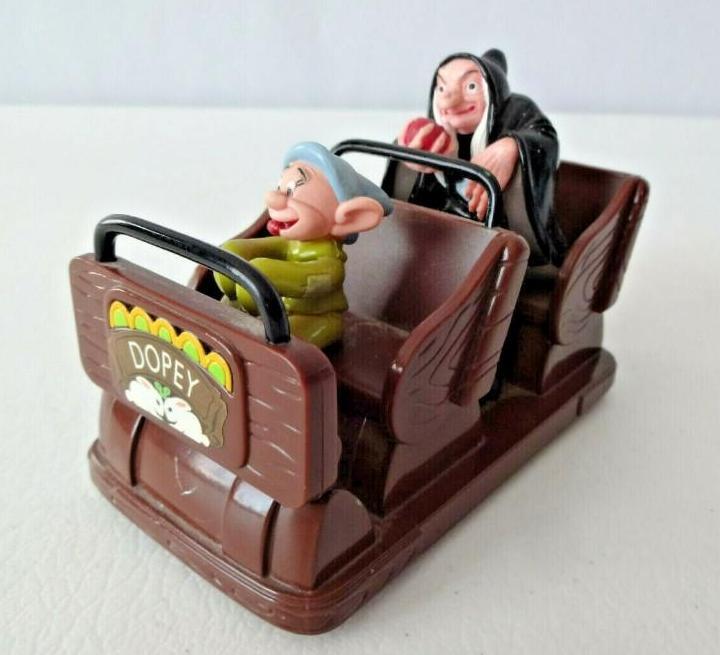 Snow Whites Scary Adventures Die Cast Vehicle: Snow White's Scary Adventures Die-Cast Metal Vehicle Theme Park Collection. A faithful recreation of the ride vehicle from 'Snow White's Scary Adventures.' Both Dopey and the Evil Queen (in her witch 