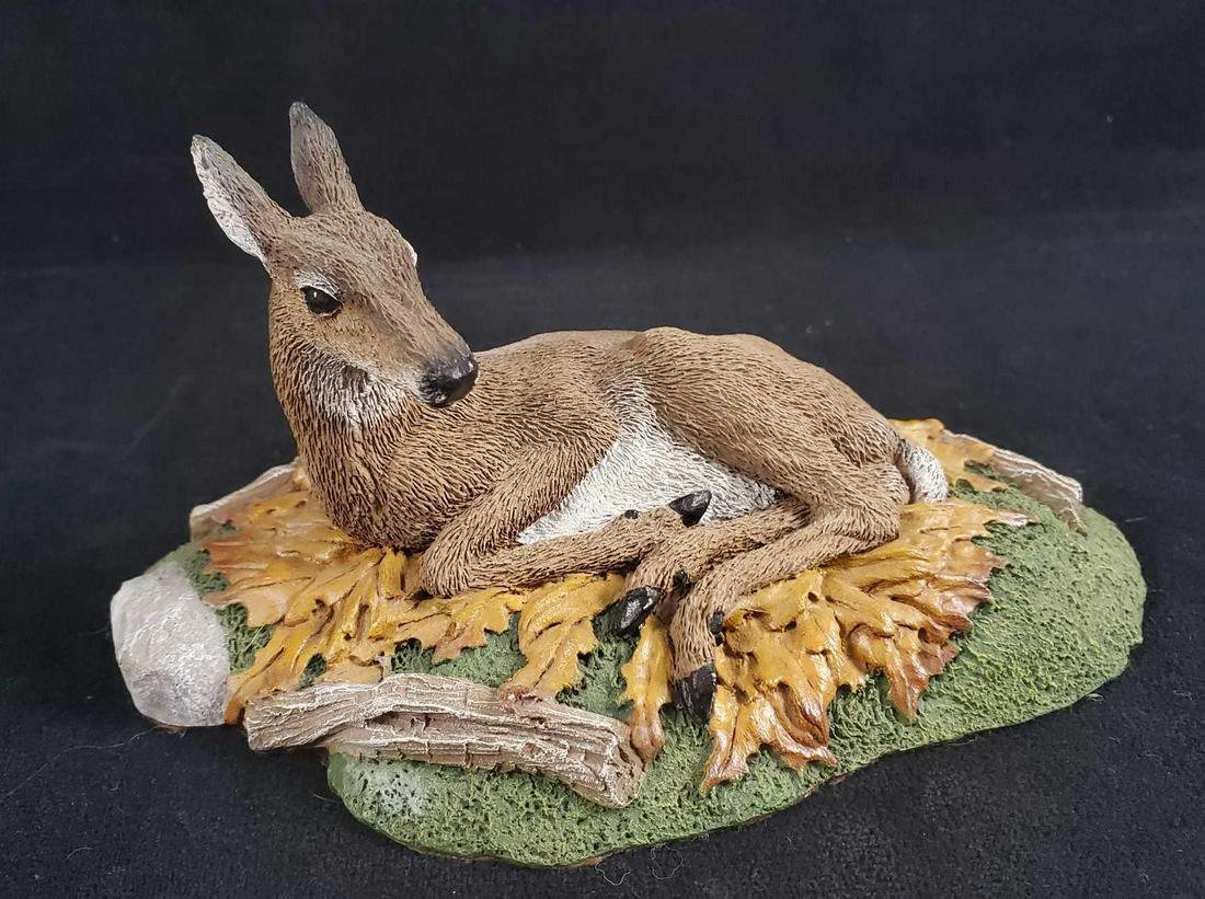 Limited Edition Gary Stevenson Silent Moment Sculpture: This highly detailed and realistic miniature sculpture of a resting doe is titled: "Silent Moment" by Gary Stevenson is replicated in wood resin and hand-painted with acrylics. It is in very good cond