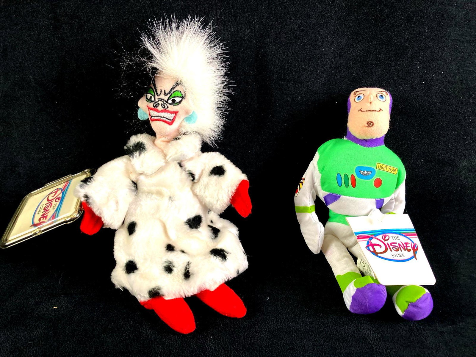 Set of (2) Disney Plush Bean Bag Dolls Buzz Lightyear: Up for auction is a recent estate find, a set of two Disney Bean Bag dolls in particular Buzz Lightyear from Toy Story and Cruella Deville from 101 Dalmatians. They came out of a twenty year collectio