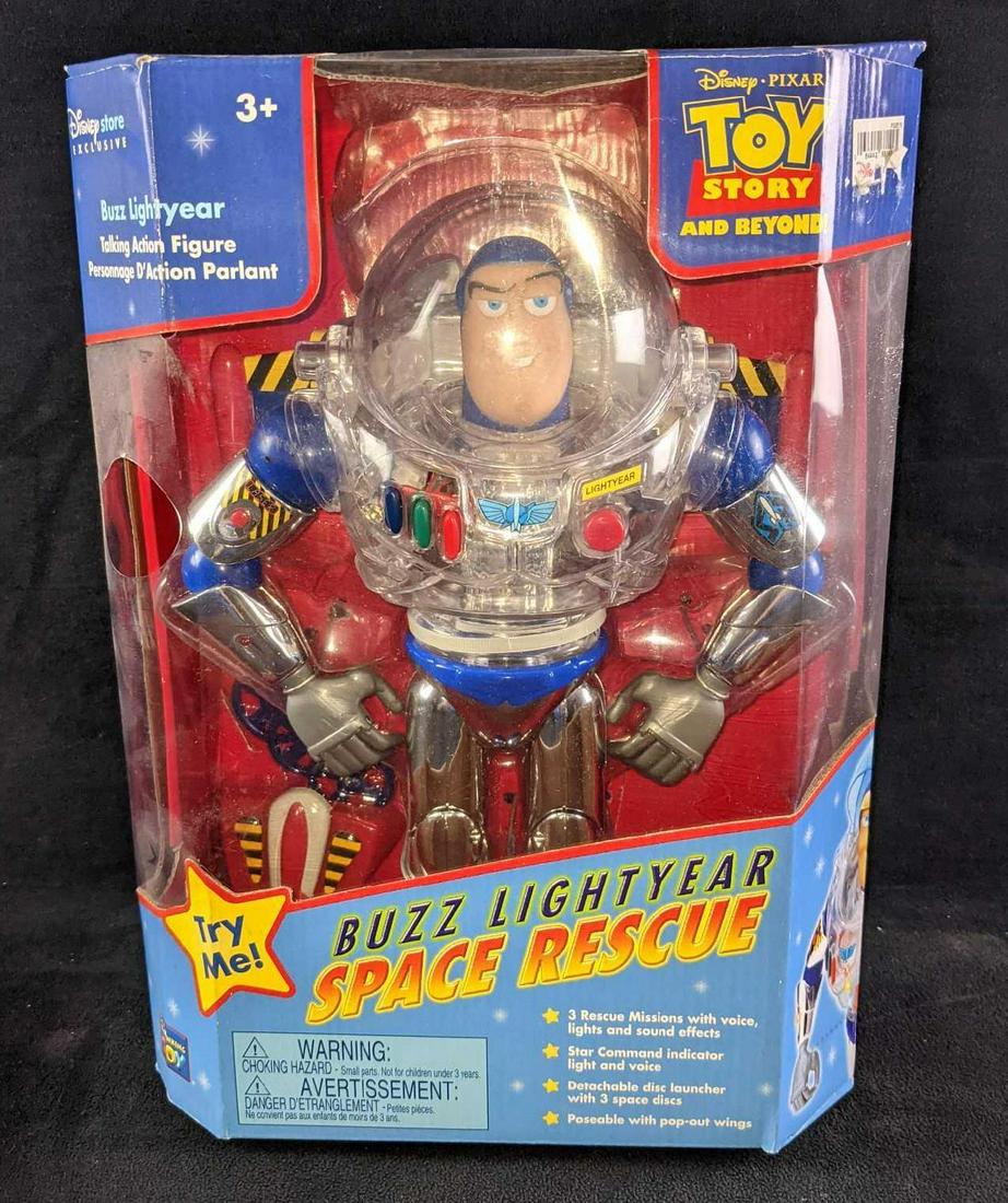Disney Toy Story Buzz Lightyear Space Rescue Talking: This is a Disney Store exclusive Buzz Lightyear Space Rescue Talking Action Figure! The figure has never been removed from its box and requires a new battery for the features to work. The box is appro