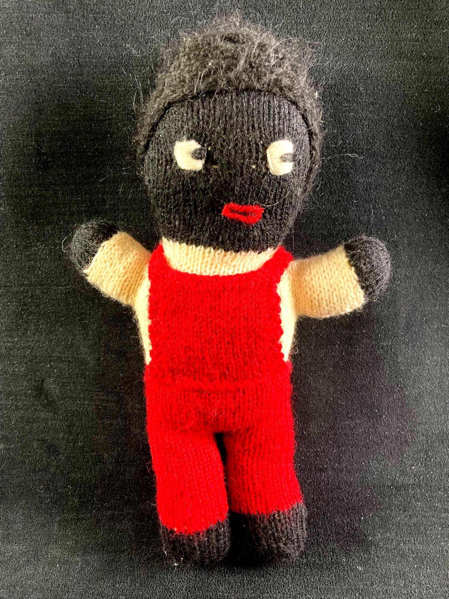 African American Sewn Yarn Doll: This lot includes: (1) African American Sewn Yarn Doll Condition is used and see photographs for details. The yarn doll is stuffed with a variety of fillers including panty hose, cotton, and other mat