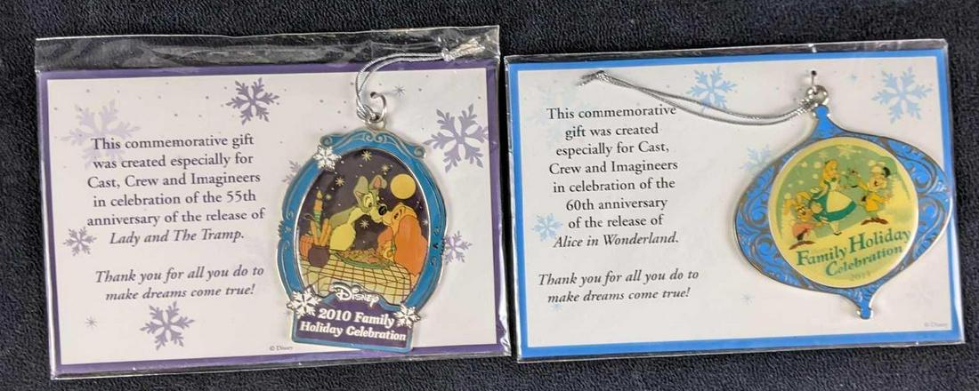 Walt Disney Cast Member Commemorative Ornaments Alice: Walt Disney Cast Member Commemorative Ornaments Alice in Wonderland Land and The Tramp (1) Lady and the Tramp 2010 55th Anniversary Ornament (2) Alice in Wonderland 2011 60th Anniversary Ornament Both