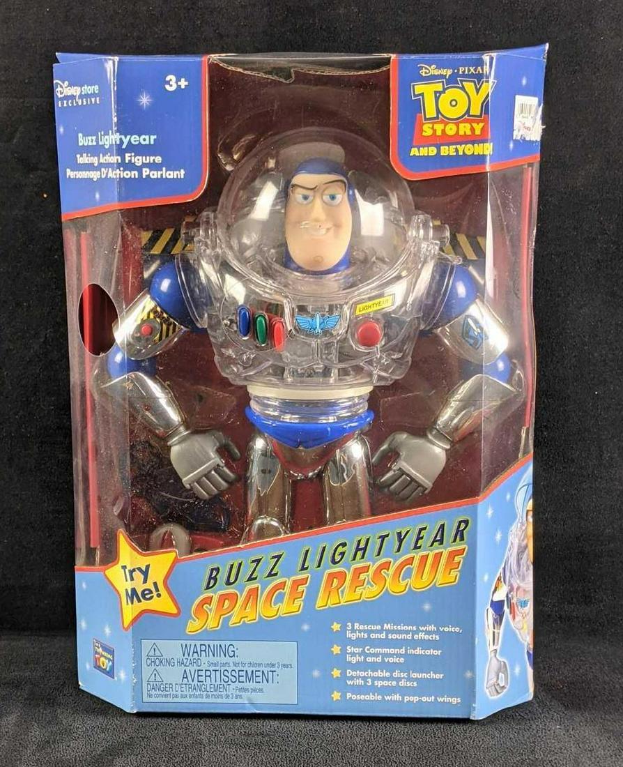 Toy Story Buzz Lightyear Disney Exclusive Unopened: Toy Story Buzz Lightyear Disney Exclusive Unopened This is a Disney exclusive Buzz Lightyear Space Rescue Talk Action Figure! The buttons/lights work and he speaks perfectly. The box is unopened. This