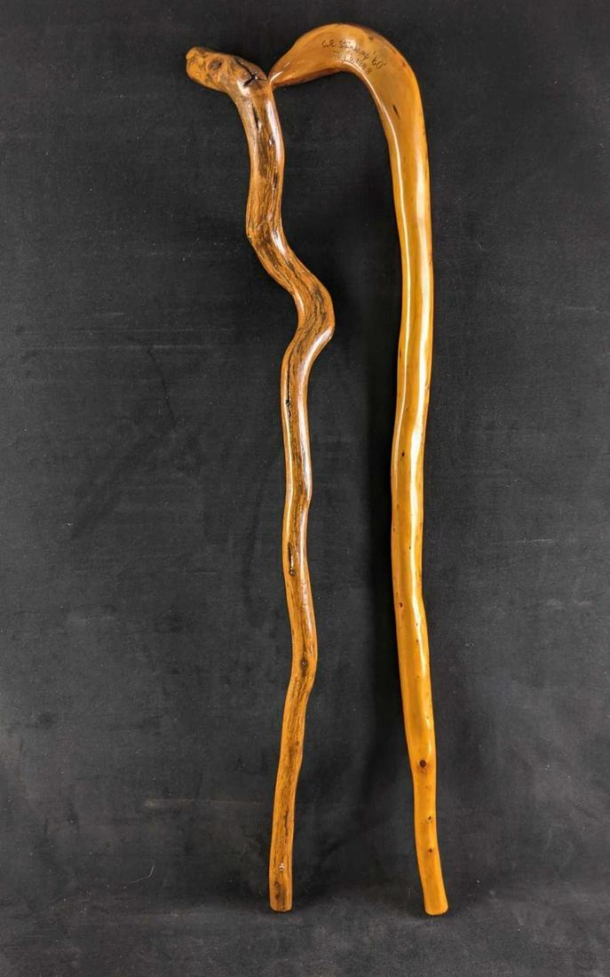 Solid Wood Walking Stick Cane Oak Walking Stick: Solid Wood Walking Stick Cane Oak Walking Stick This is a lot of 2 walking sticks or canes. these are in great used condition, with no cracks or known damage. One walking stick looks like it is made f