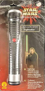 Star Wars Costume Qui Gon Jinn Lightsaber Jedi B: Plastic Star Wars Jedi Knight green lightsaber. Made from sturdy injection-molded plastic with a light-up telescoping blade. Measures approximately 36" once extended. Two AAA batteries not included. O