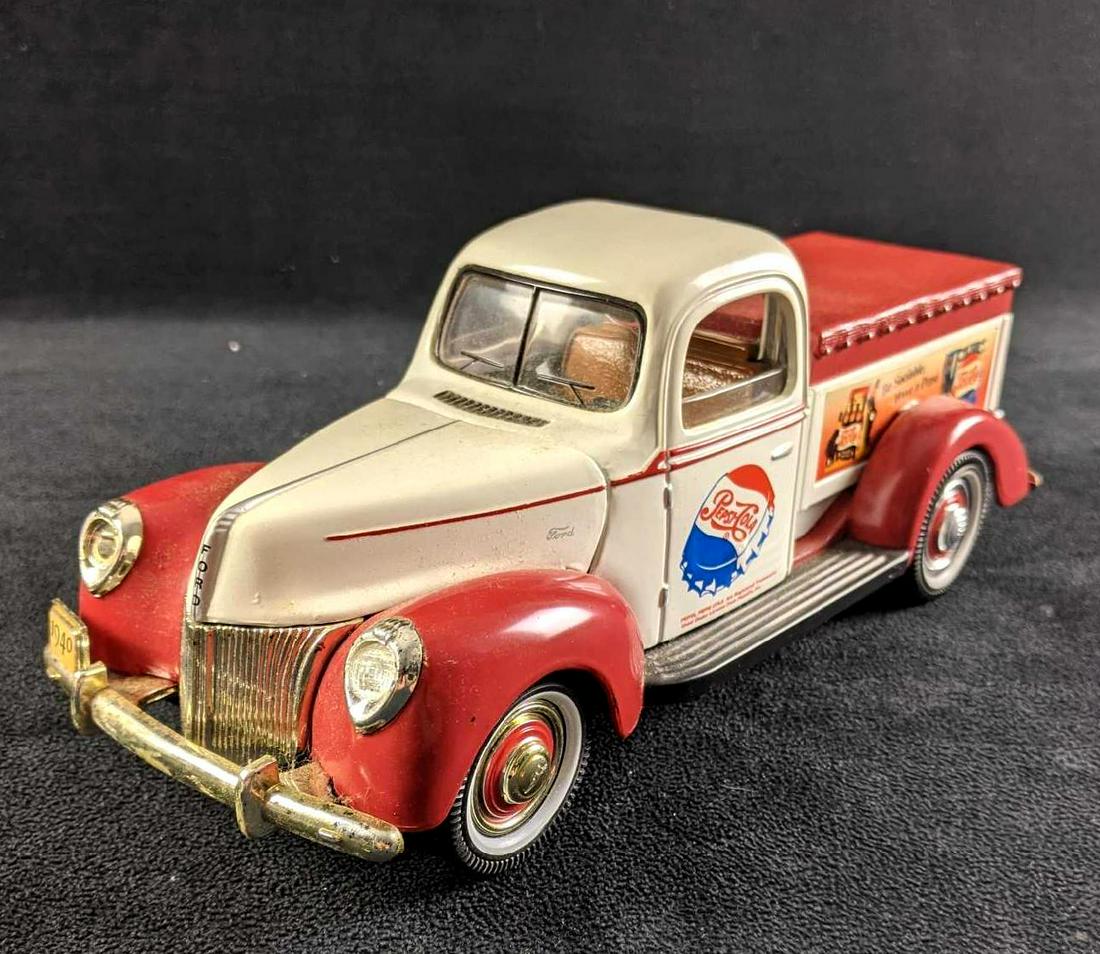 Vintage Ford Pepsi-Cola Delivery Truck Diecast: Vintage Ford Pepsi-Cola Delivery Truck Diecast This is a Golden Wheels Diecast of a Pepsi delivery Ford Truck. This is in good condition with no known damage. Its hood flips up to show its engine. 10i