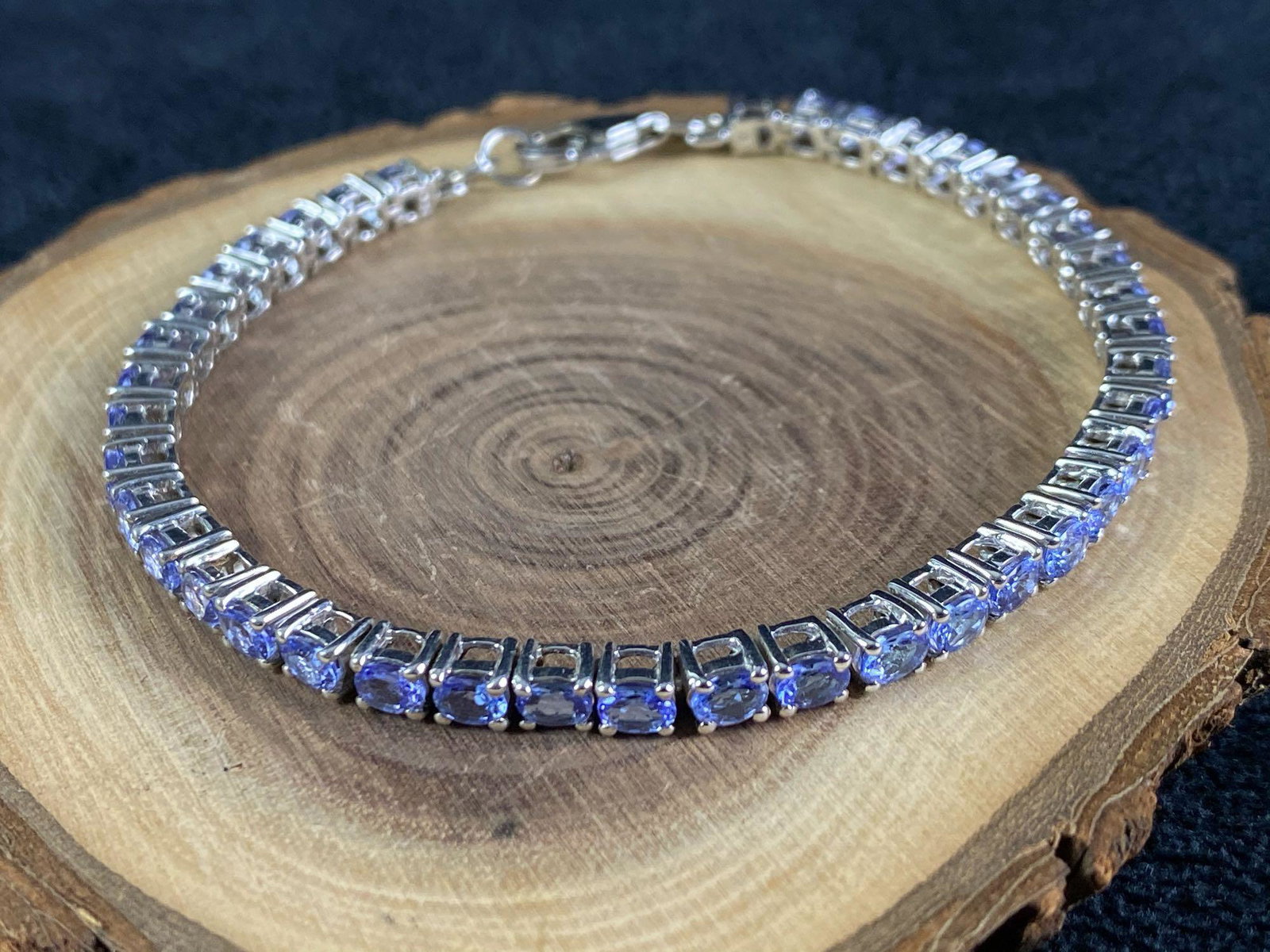 Estate Sterling 925 4.8 CTW Tanzanite Tennis Bracelet: This fine jewelry piece has been tested and researched prior to listing. Please view all our pictures prior to bidding they are part of our description. Thank you happy bidding DETAILS: Metal - Sterli