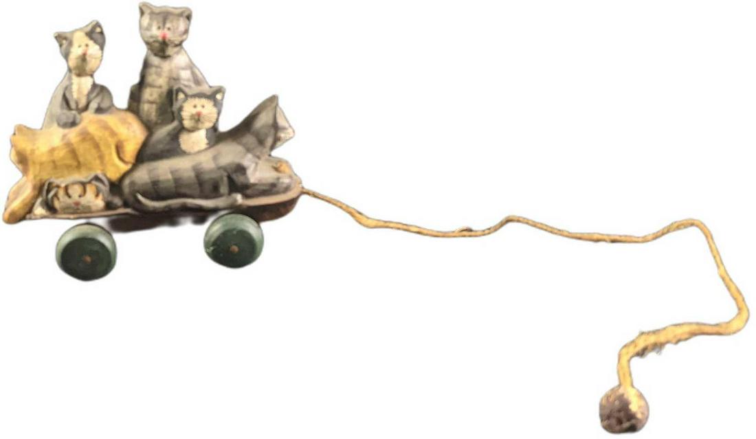 Wooden Resin Kitty Pull Toy On Wheels: Wooden Resin Kitty Pull Toy On Wheels. The maker and date of creation is unknown. Great as a toy and decoration. Is approx 8" x 3" x 7" and it weighs under one pound at 0.44lb. The pull string is appr