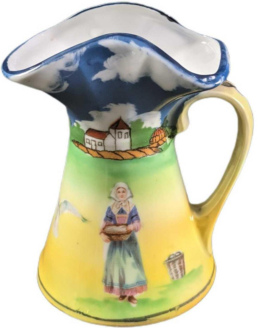 Vintage Royal Bayreuth Bavarian Brittany Woman Creamer: Vintage Royal Bayreuth Bavarian "Brittany Woman" Fine China Creamer. Is approx 3 1/2" x 2 3/4" x 4 and it weighs under one pound at 0.23lb. The creamer is in a good, vintage condition with some markin