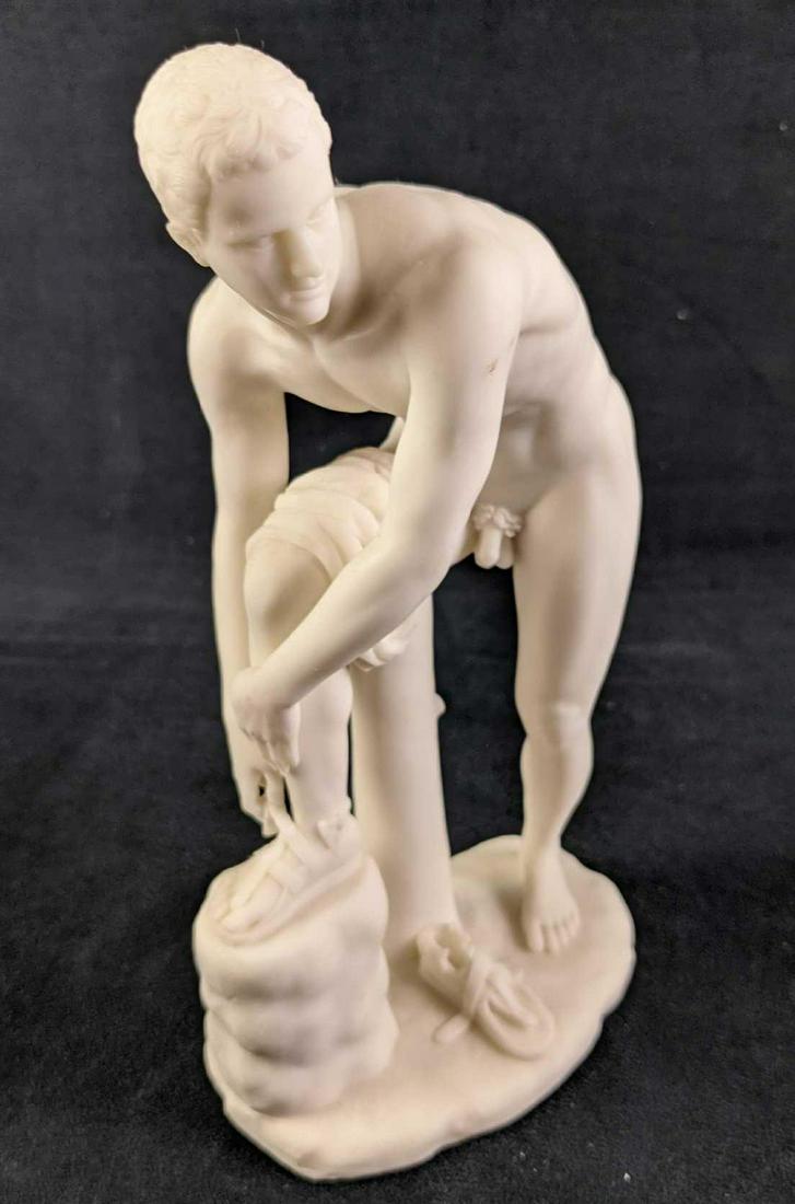 Veronese Design Nude Greek Hermes Taking Off Sandals: Veronese Design Nude Greek Hermes Taking Off Sandals. Made of resin and made to resemble marble. The figurine is approx 5" x 3" x 10" and is in a good, used condition with light markings.