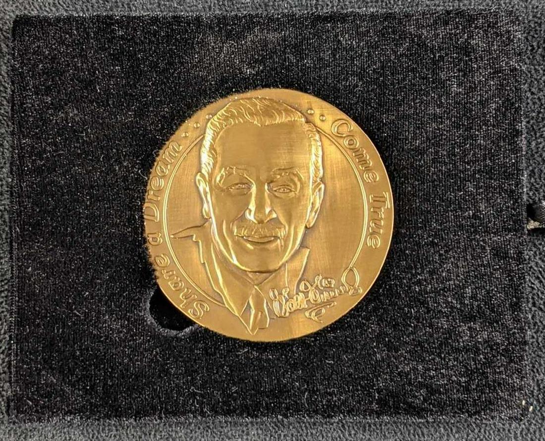 Disney World Share a Dream Come True Walt Medallion 100: Disney World Share a Dream Come True Walt Medallion 100 Years of Magic. Was originally handed out to Disney Employees during the "100 Years Of Magic Celebration". The medallion comes with a holder tha