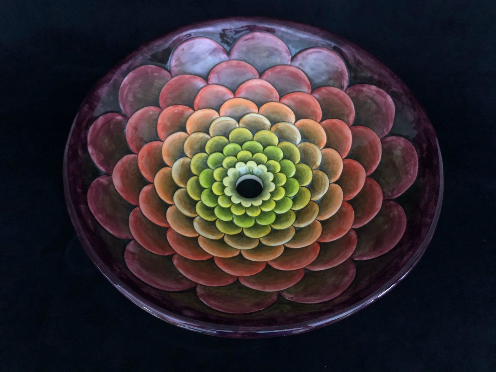 MAZARI Handmade " Flores De Fuego " Artist Signed Above: MAZARI Handmade " Flores De Fuego " Signed Standing Sink Over fifty years ago Rudi and Nancy Marzi started a business in Carmel Valley California that we now know as Marzi Sink Factory. Today, in our 