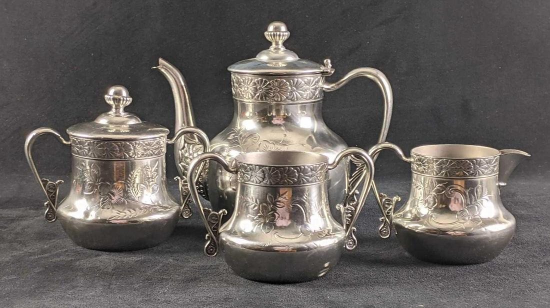 Silver-Plate Tea Set Hartford Silver Co: Silver-Plate Tea Set Hartford Silver Co This seems to be a complete tea set from Hartford Silver Co. Quadruple Plate. These have some tarnish but not much. This set is in good condition with no dents.