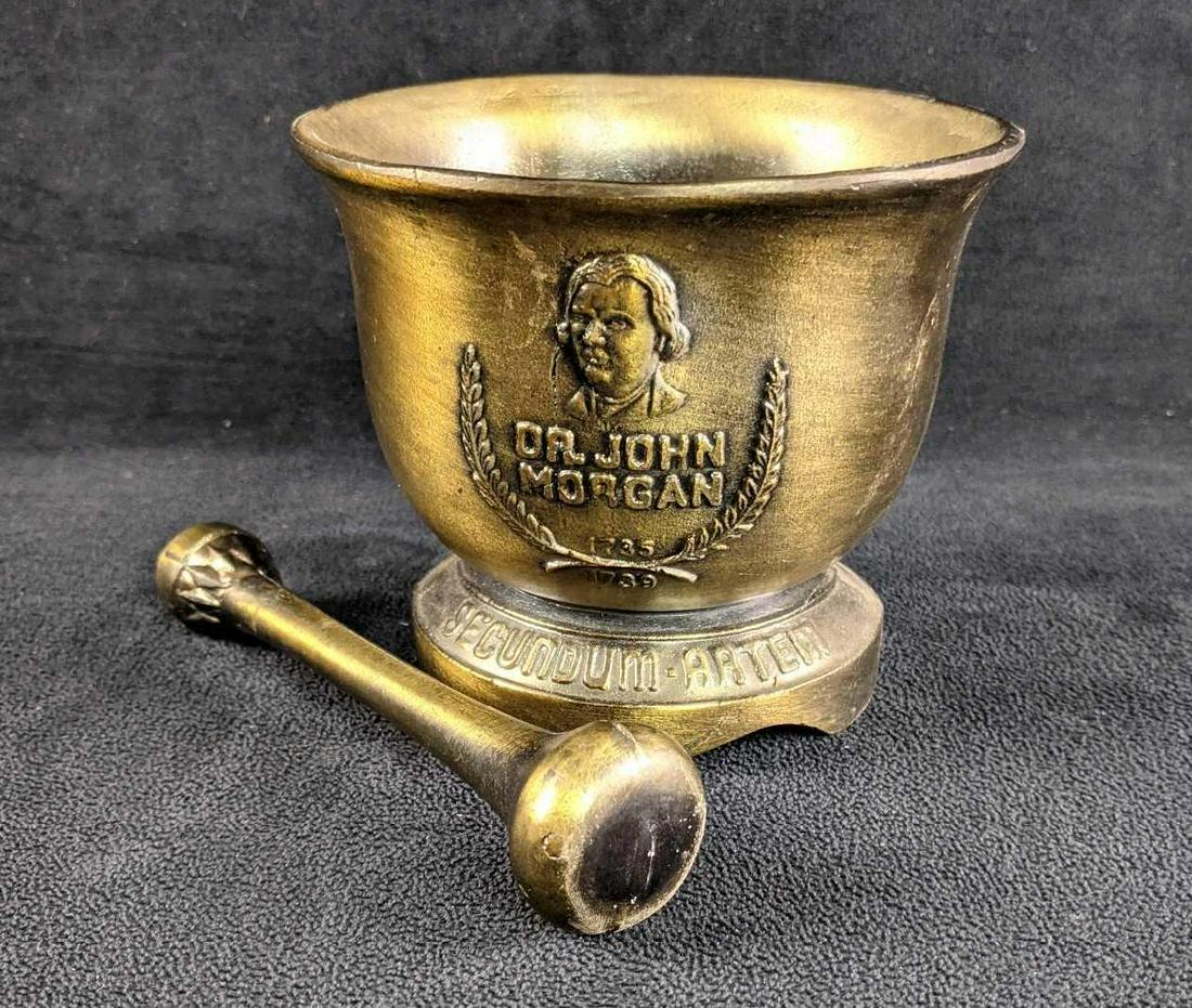 Vintage Mortar & Pestle Commemorating Dr. John Morgan: This is a vintage bronze patina mortar with original pestle Commemorating Dr. John Morgan. This was probably used as a decoration/ display in a pharmacy. This is made from metal with a bronze patina o