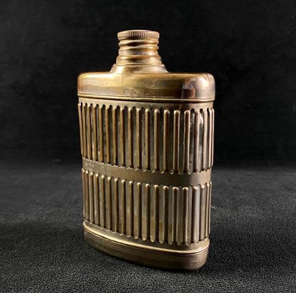 Prohibition Era Chrome Caged Glass Flask: Prohibition Era Chrome Caged Glass Flask This chrome-plated caged glass flask from the Prohibition era is a great historical piece from a unique era in American history. With its sleek Art-Deco design