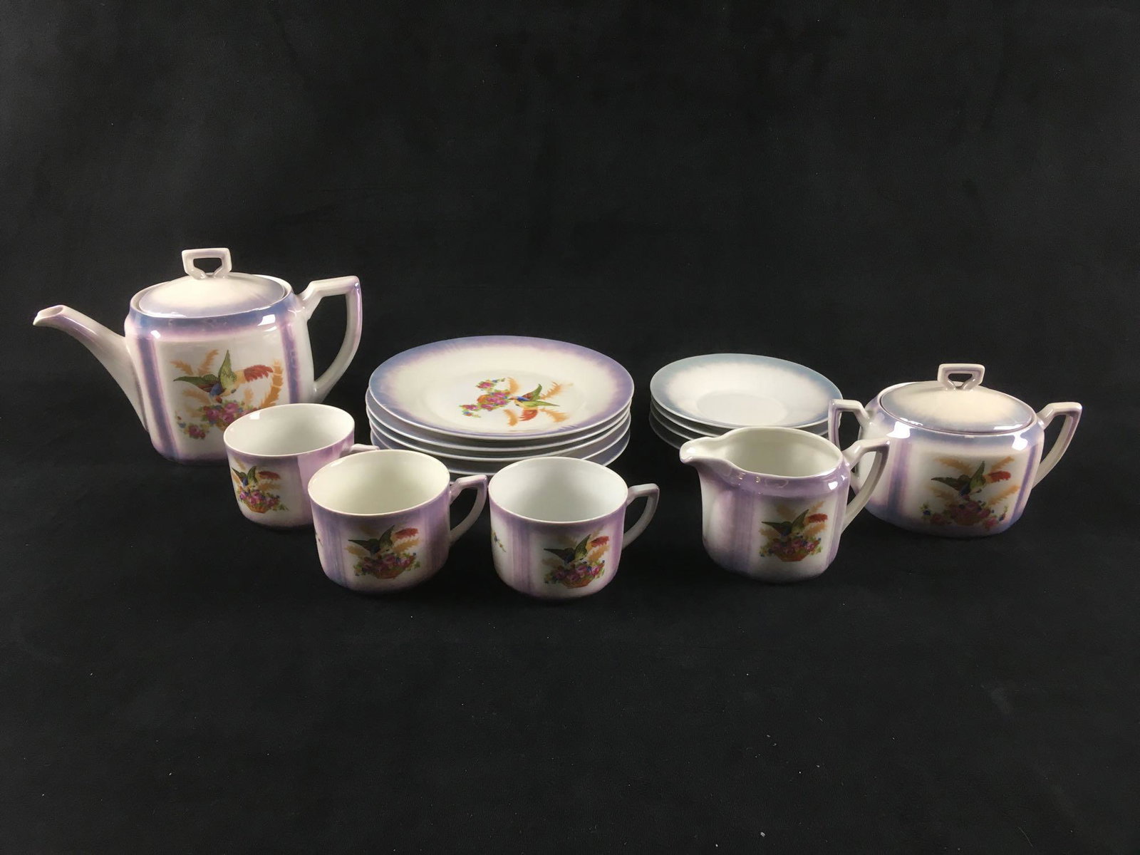 Light Purple Floral G.E. Made in Germany Lusterware: Light Purple Floral G.E. Made in Germany Lusterware. This set is in great condition. One of the small plates has a small chip out of the rim, and there is very minor areas of painting missing, but oth