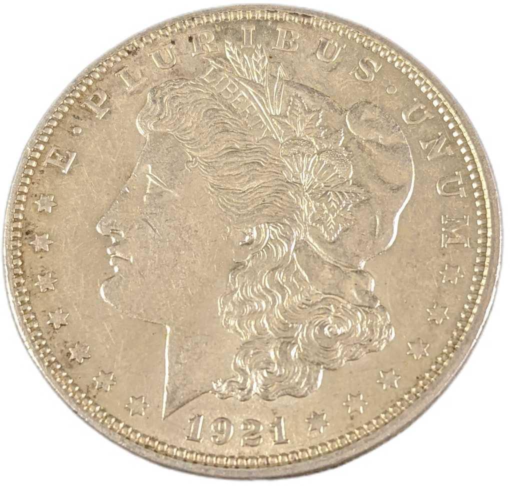 1921 US Morgan Silver Dollar: 1921 US Morgan Silver Dollar Coin: Morgan Silver Dollar. Mint Mark: Denver. Silver: 90% Year: 1921. Condition: VF. Condition is based on our opinion. Please view all our images as they are part of the