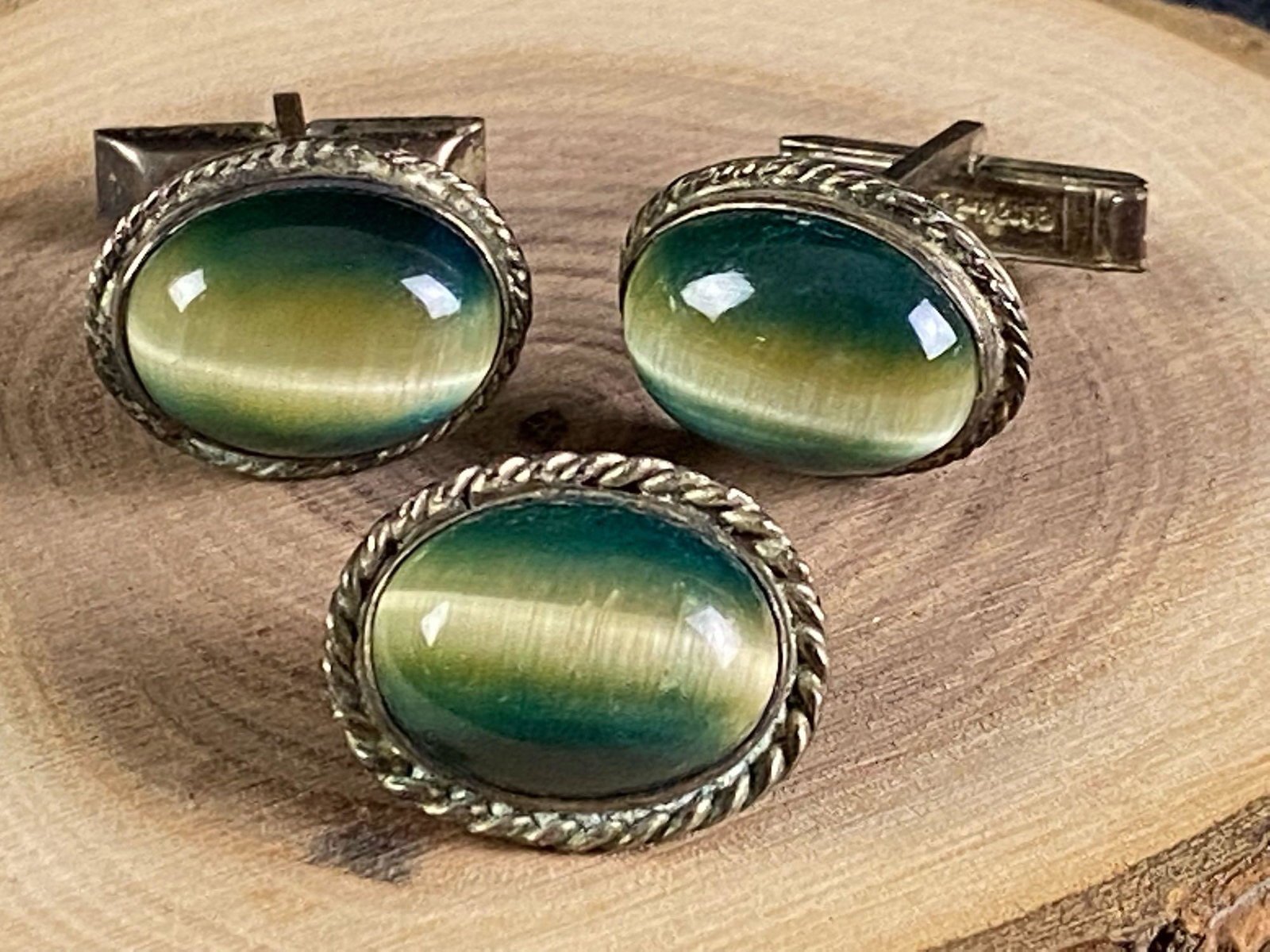 Vintage Unique Handmade Sterling Green Cats Eye: This fine piece has been tested and researched prior to listing . Please view all our pictures they are part of our description . Metal - Sterling 925 Color - Silver Stone - Green Cats Eye Size -19mm 