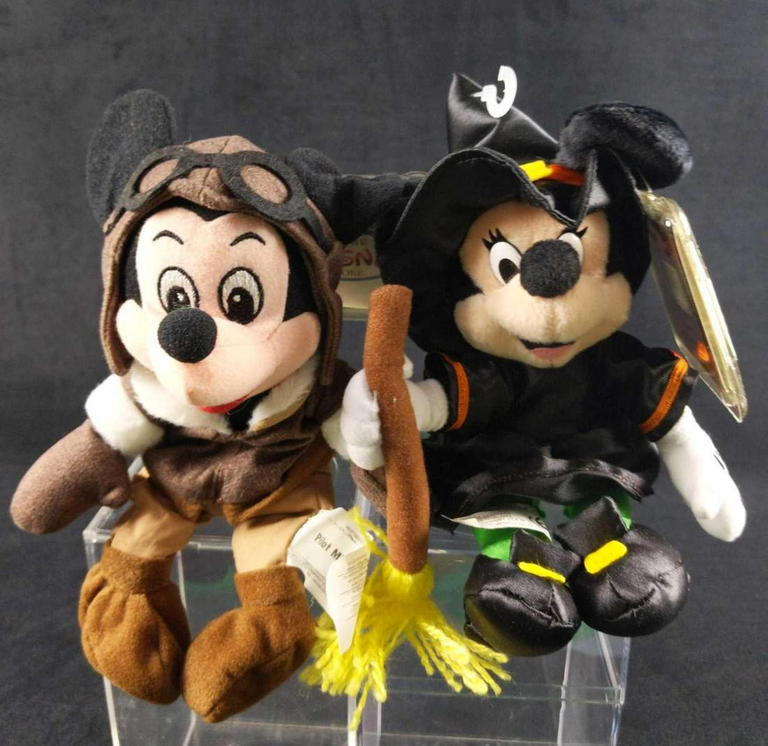 Disney Bean Bag Doll Pilot Mickey Witch Minnie: This lot consists of: (1) Pilot Mickey Mouse Bean Bag Doll. Is approx 7" x 4" x 9". Has no known damage. (1) Disneyland Paris Halloween Witch Minnie Mouse. Is approx 7" x 3" x 9". The dress keeps curl