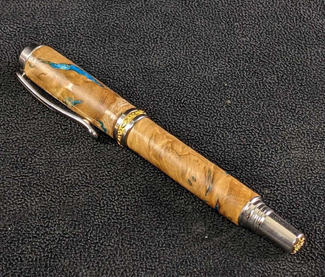Dayacom Wooden Pen Exterior: Dayacom Wooden Pen Exterior This pen has a beautiful wooden exterior with gold-plated detailing and nib from Germany. This pen is like new with no box. This pen seems to be from a high-end pen kit. Th