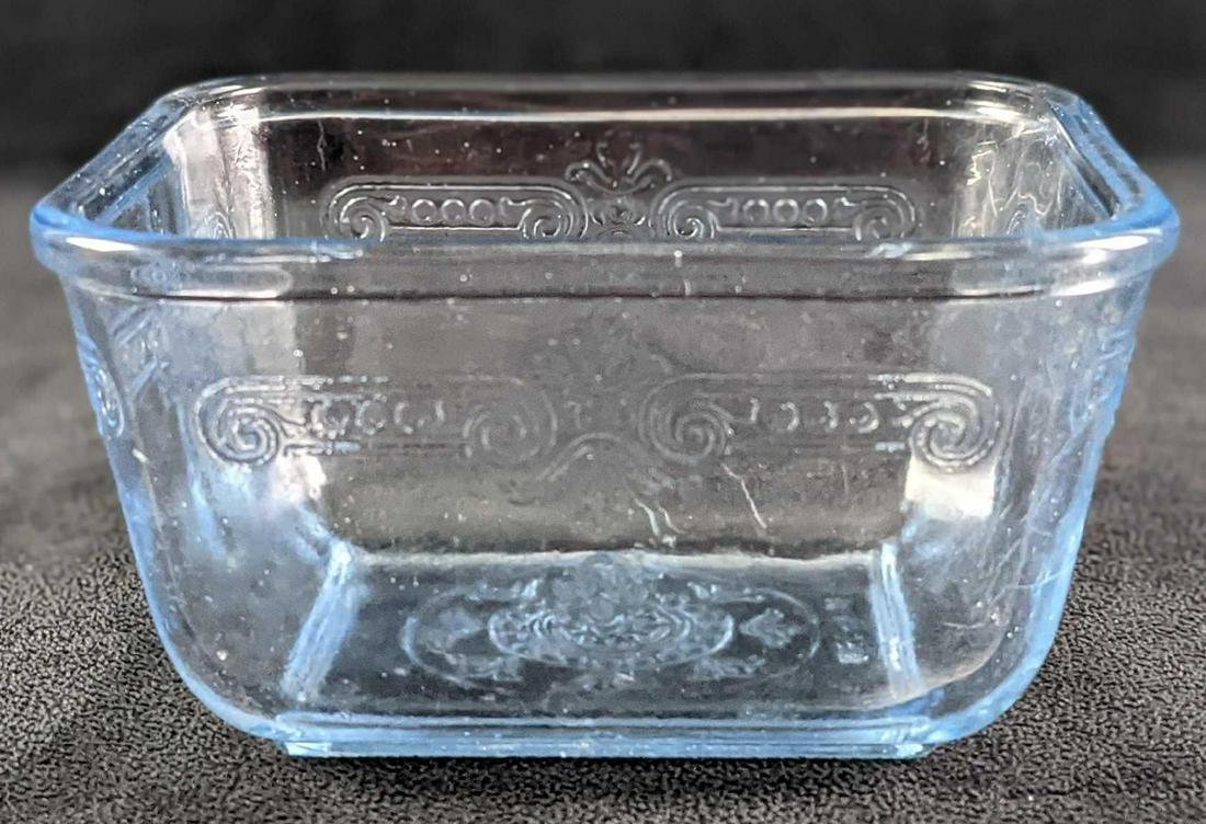 Fire-King Sapphire Blue Philbe Refrigerator Dish: This listing is for a vintage Fire-King refrigerator dish that is about 70-80 years old, produced by Anchor Hocking in the '40s. This dish is made of lovely blue glass and has a pressed design which i