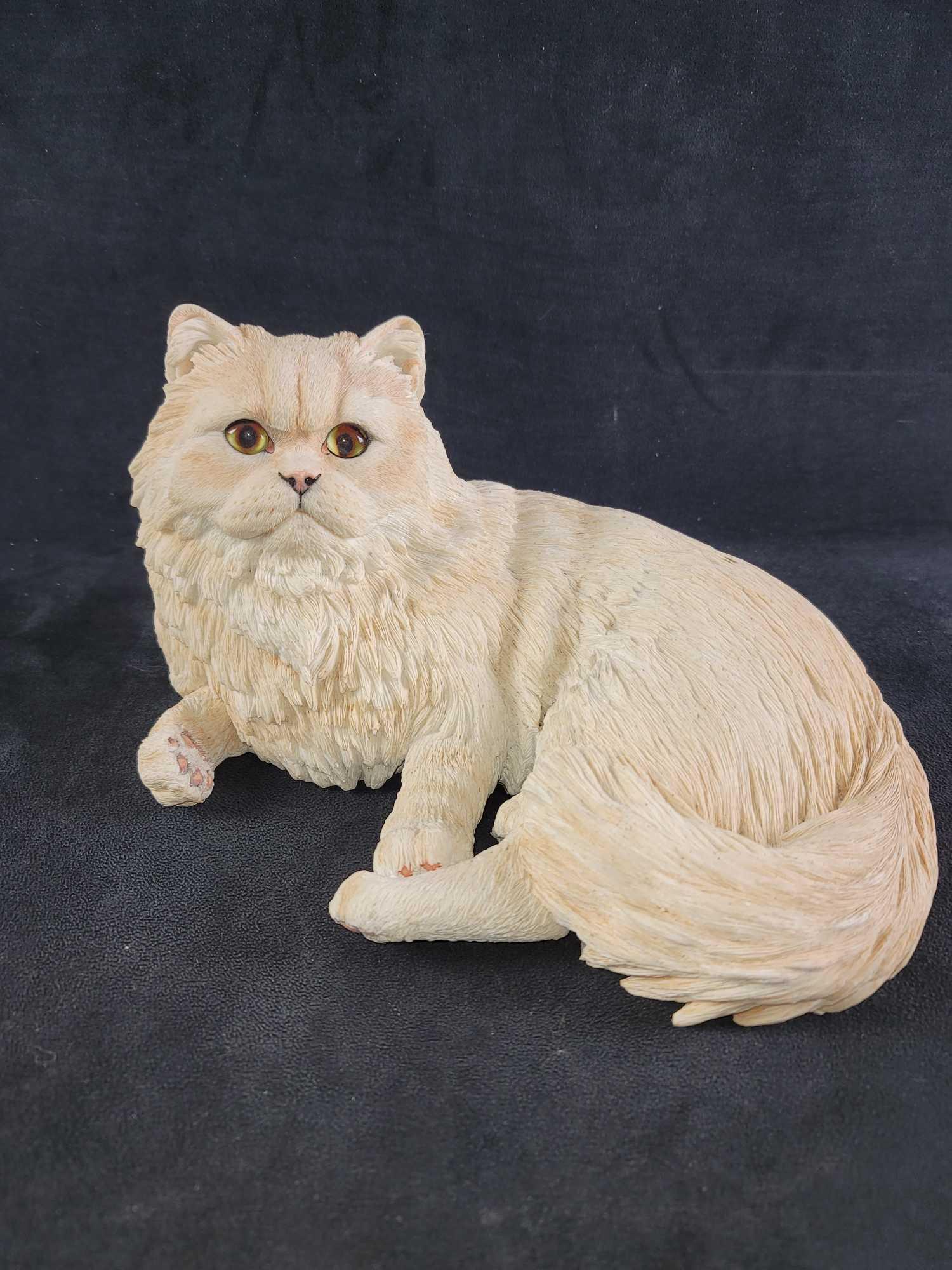 Long Hair White Cat Feline Statue: This resin white long hair cat looks great on a table top or at the foot of the bed. Lovely detail and piercing eyes. The maker and date is unknown. In good used condition. No known damages. The botto