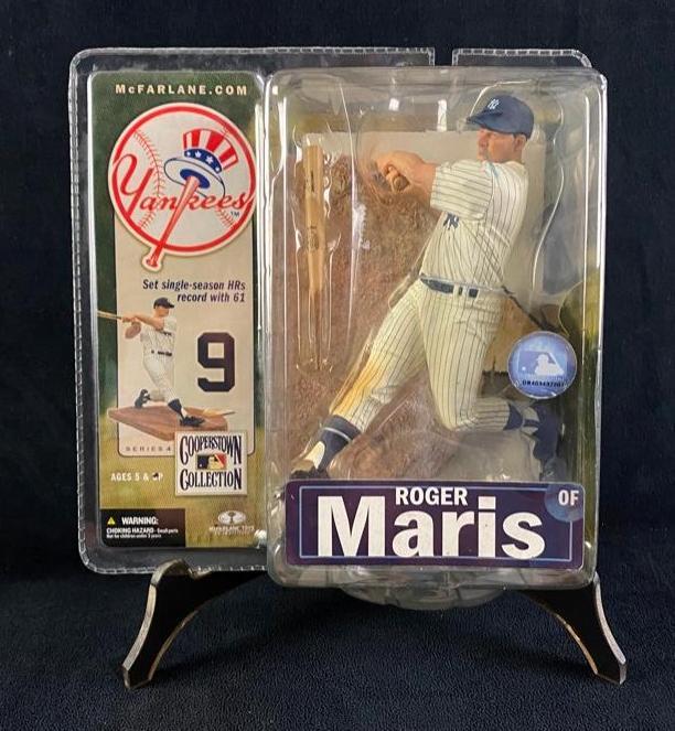 Roger Maris Collectible Action Figure: Roger Maris Collectible Action Figure This officially-licensed 2007 figure from the Cooperstown Collection features the home-run record breaker in a swinging stance over home plate with a miniature Lo