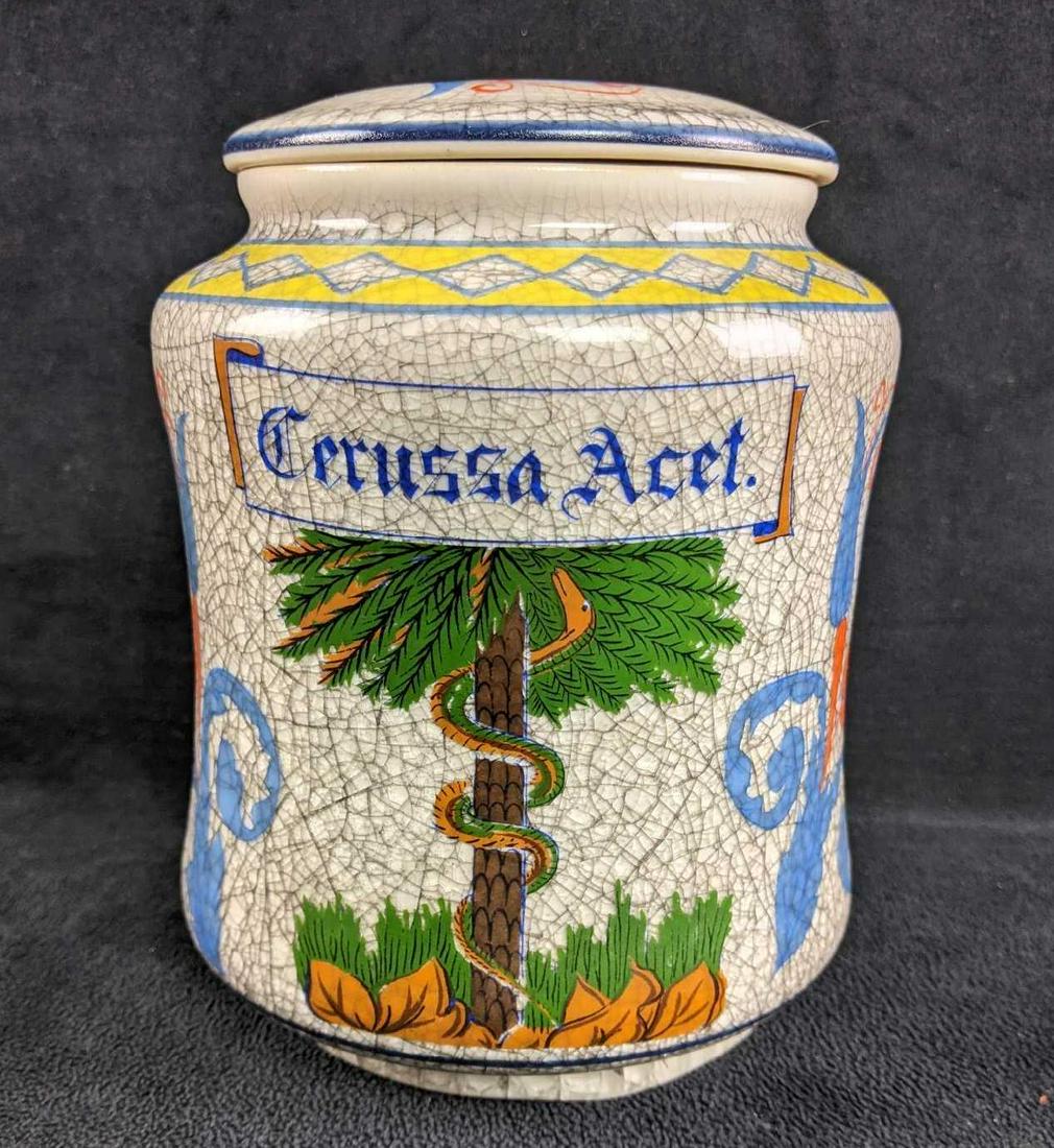 Italian Apothecary Jar: This apothecary jar is a nice touch to any space. It is in good condition with no known damage. The crazing on the jar was a design choice. This jar says something in Italian on the front with beautif