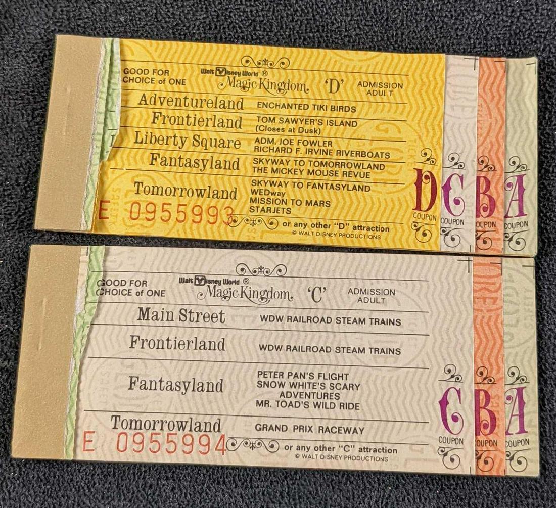 Vintage Walt Disney World Ticket Books: This lot includes two ticket books, both have tickets C, B, & A. One of the books also has a ticket for a D attraction. The booklets are approx 2" x 5" and have rips where the previous tickets used to